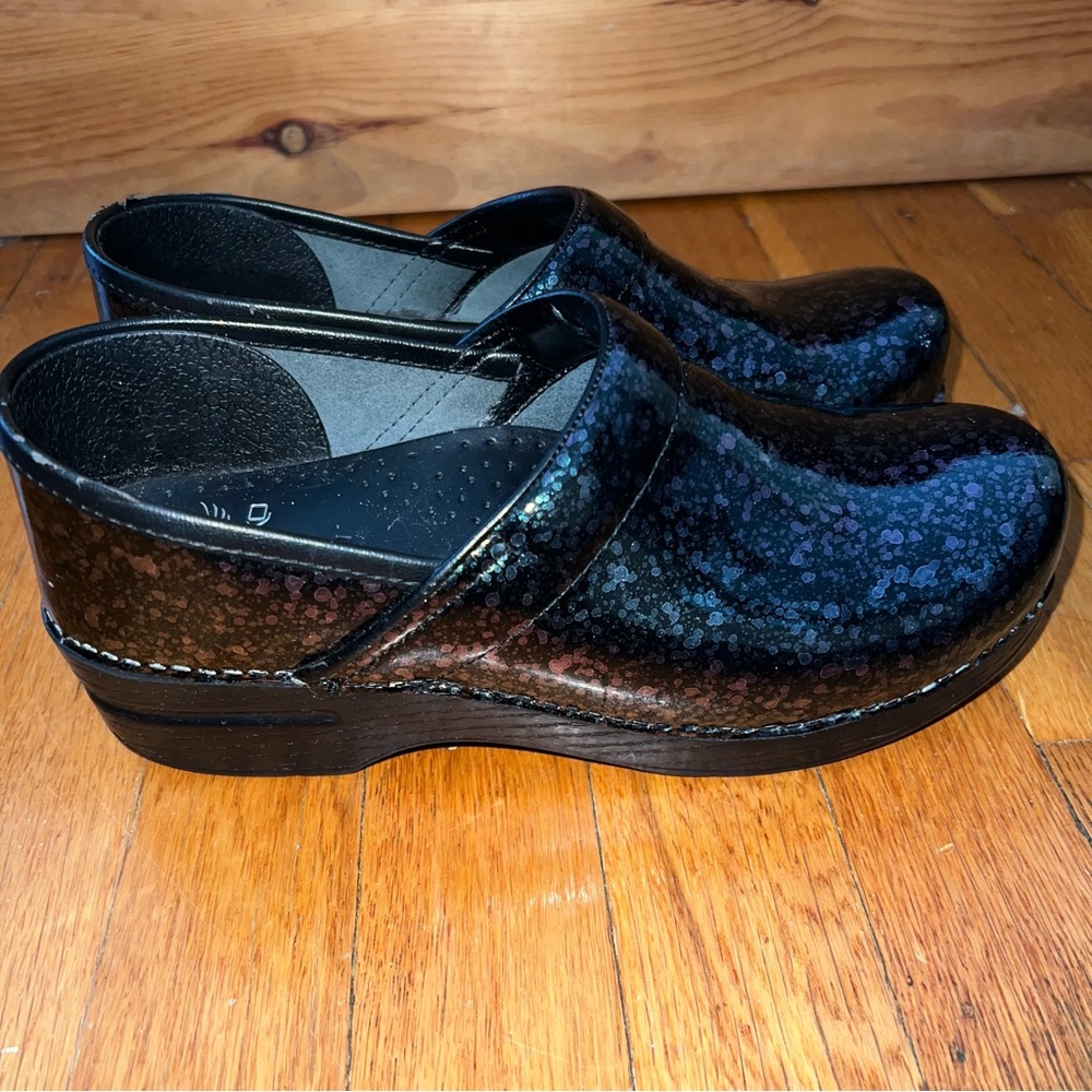 Dansko Women's Black Patent Paint Splatter Clogs. Good Used Condition